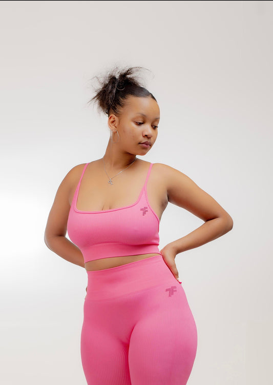 ThirioFit MSN Ribbed Crop: Elevate your workout style with this trendy activewear crop top featuring a chic ribbed texture for a touch of sophistication. 